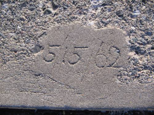 [5/15/62 written in the sidewalk]